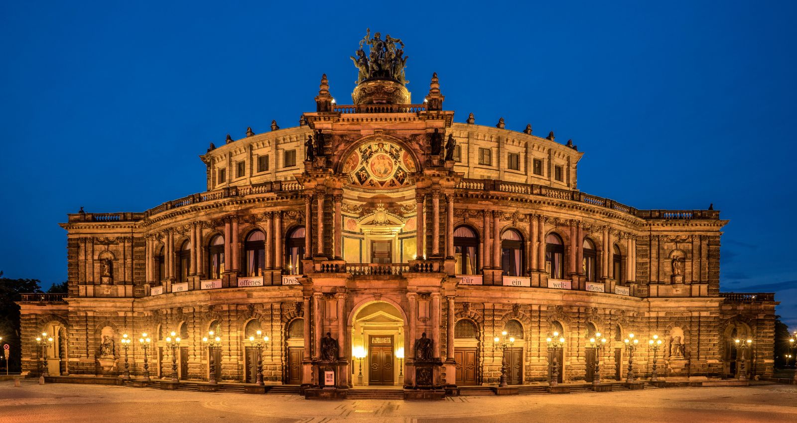 Explore the illuminated Semper Opera House in Dresden, Germany, on our 2025 opera tours. Join us for an unforgettable cultural experience.